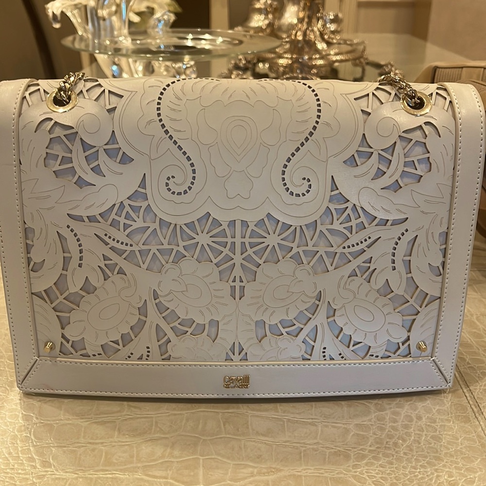 Italian leather laser cut handbag ROBERTO CAVALLI.  .super condition .